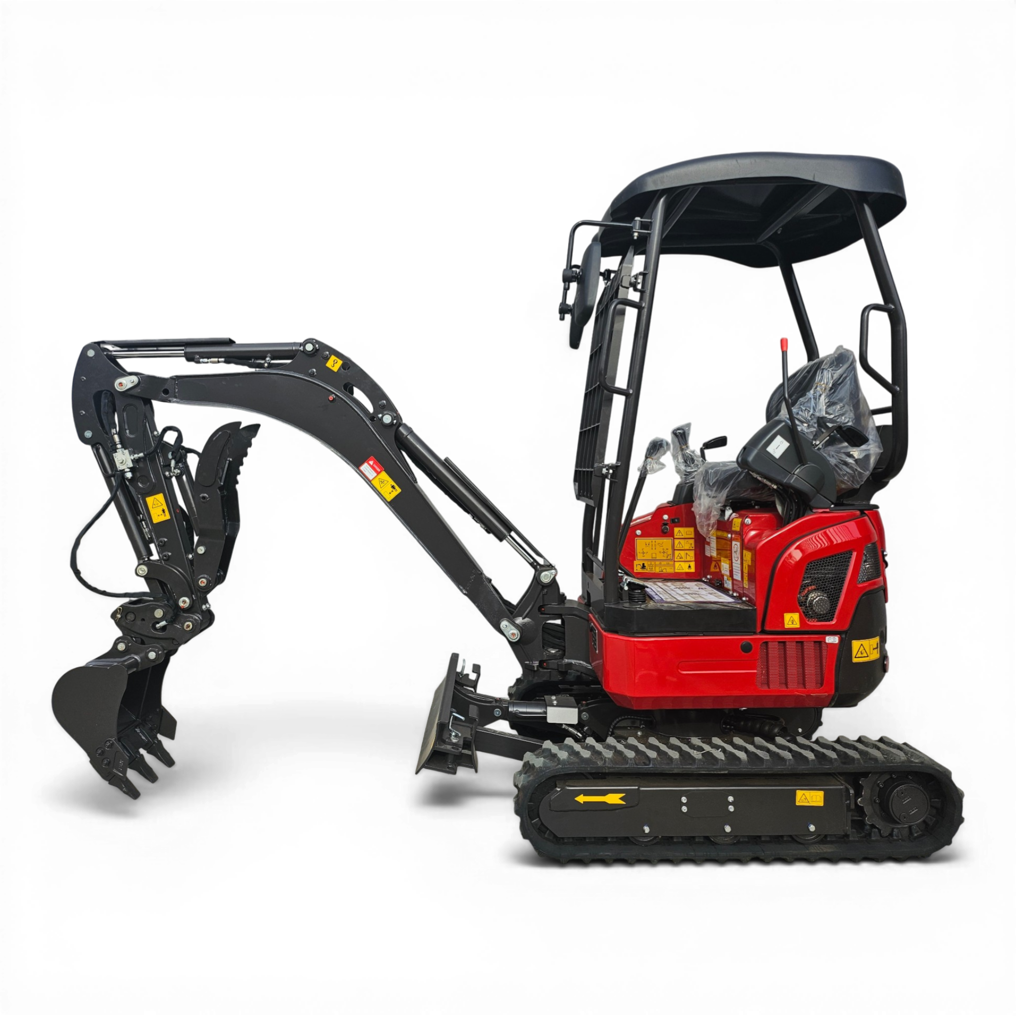 Red compact excavator with black hydraulic arms and a digging bucket on a black background (partial crop)