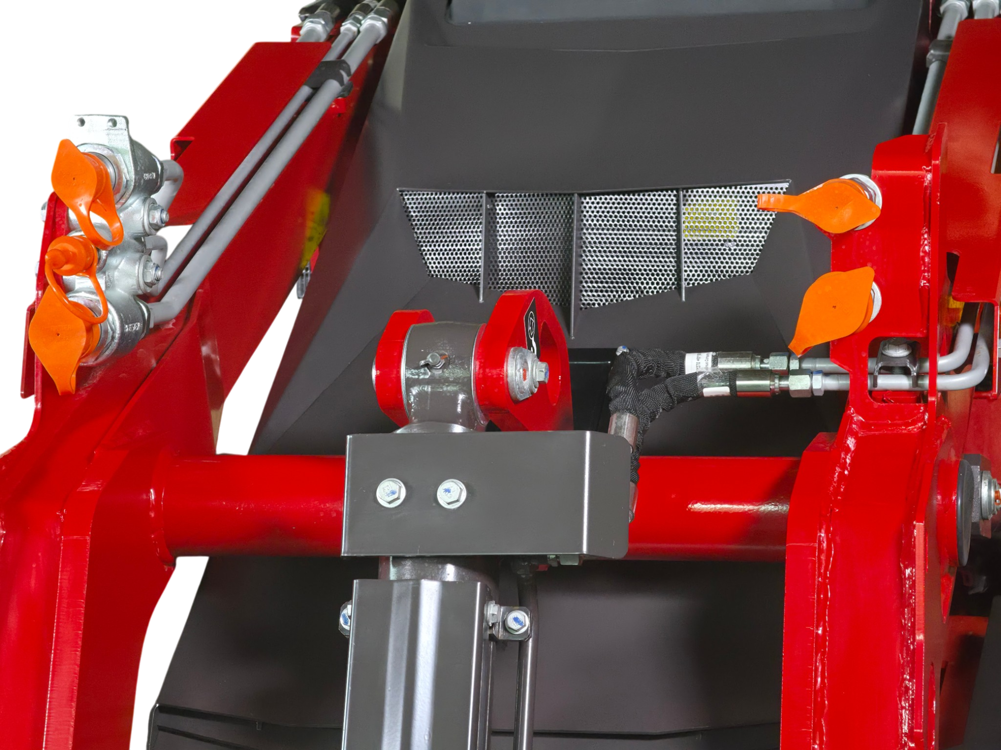 Close-up of red industrial machine frame with orange control levers, gray hoses, and a perforated metal guard area