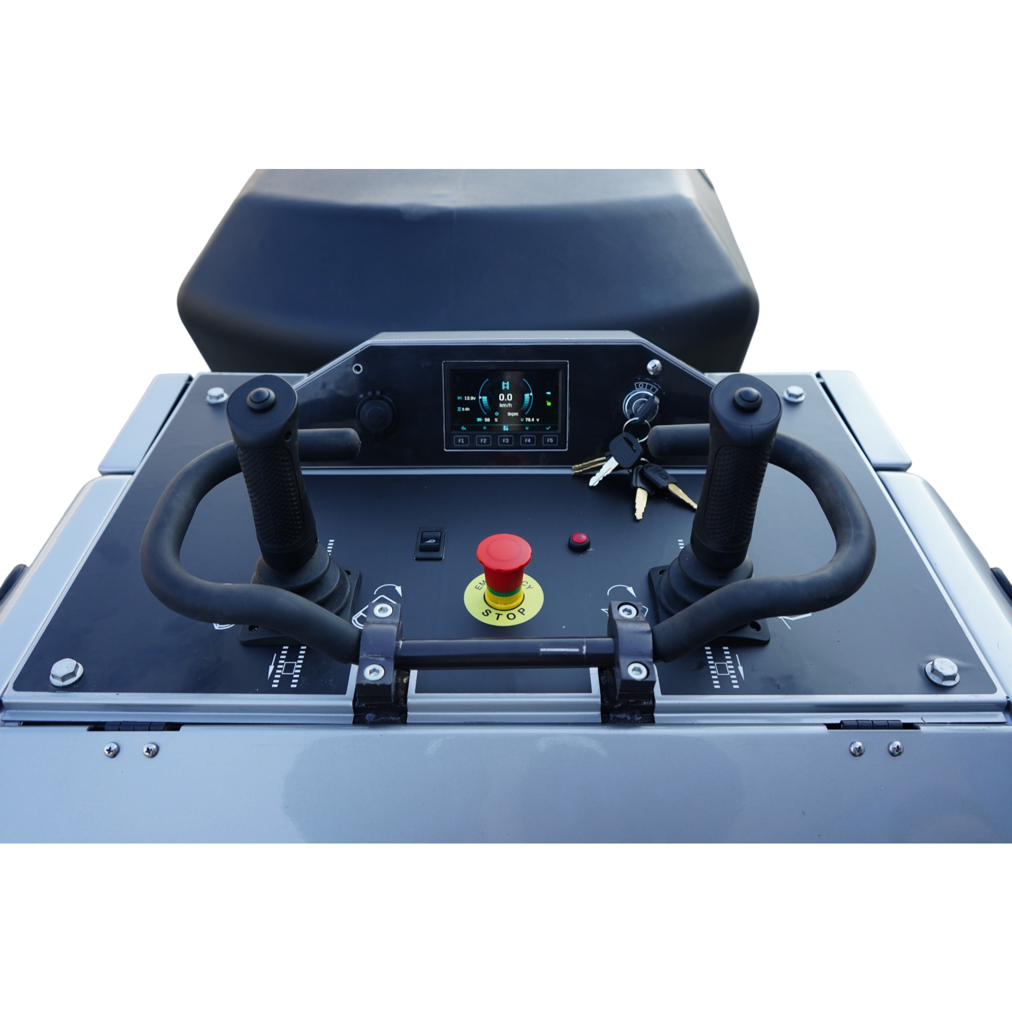 Close-up of an industrial control panel with dual joystick grips, a digital display, and a prominent red emergency stop button.