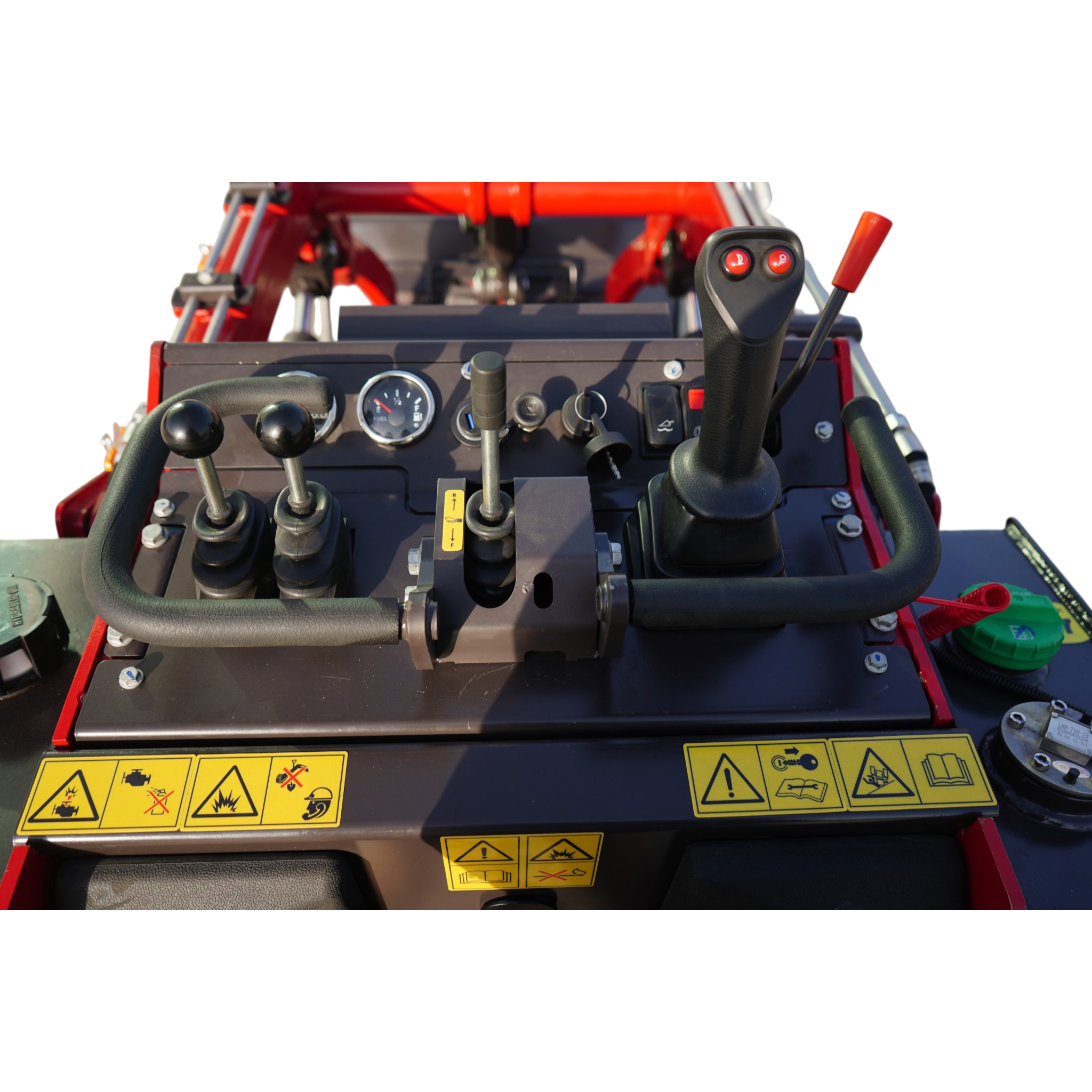 Close-up view of a heavy machinery operator cockpit showing multiple levers, a joystick, and instrument gauges, with prominent yellow warning stickers along the lower dashboard.
