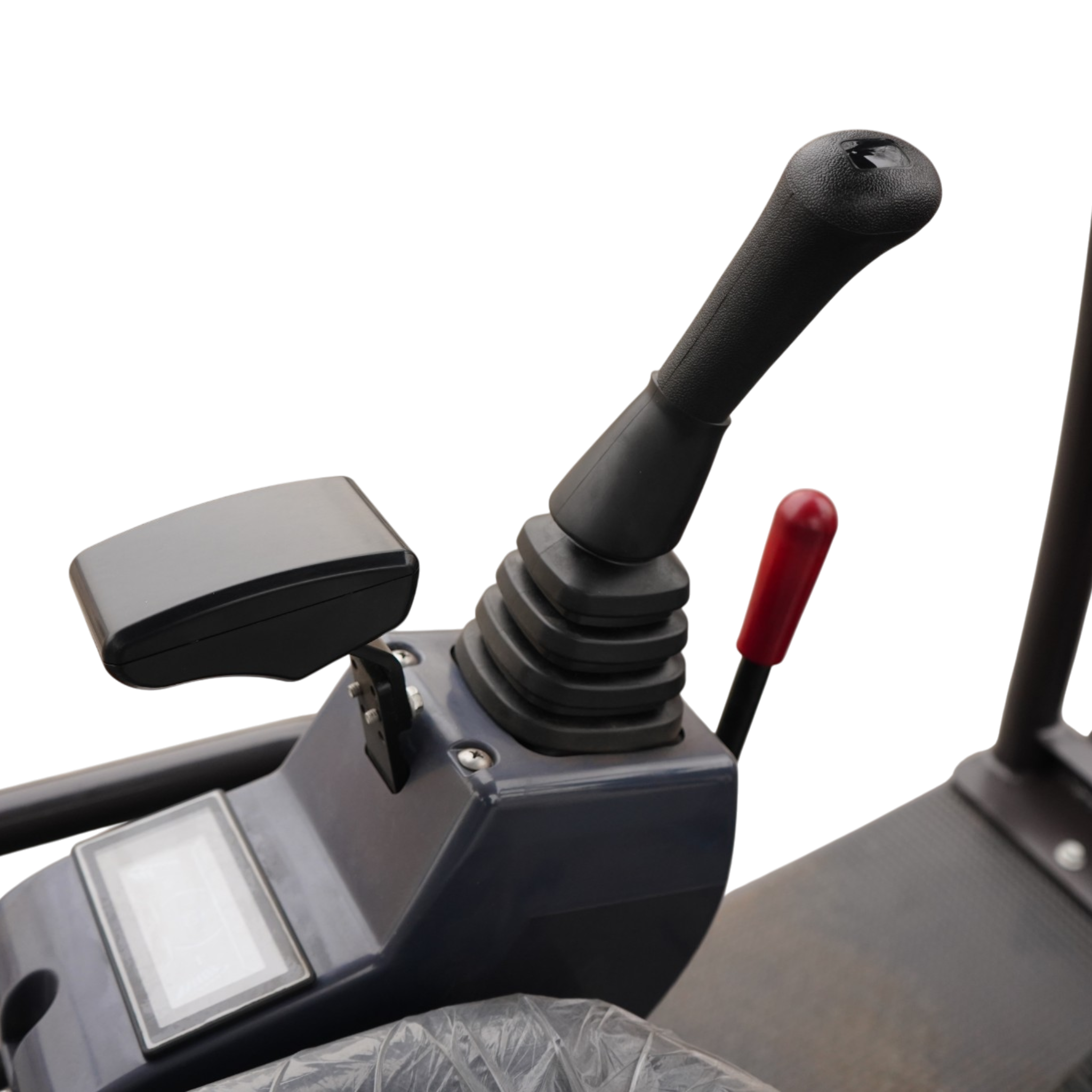 Close-up of an industrial joystick with a black textured handle, red lever, and a small display panel on a metal console.